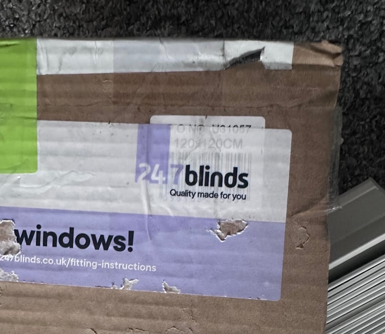 White fauxwood venetian blind