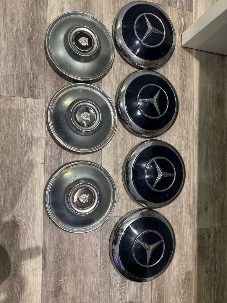 Vintage Mercedes and Jaguar Hubcaps
