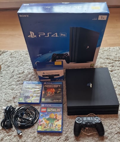 Sony PlayStation 4 Pro 1TB console with a PS camera and 3