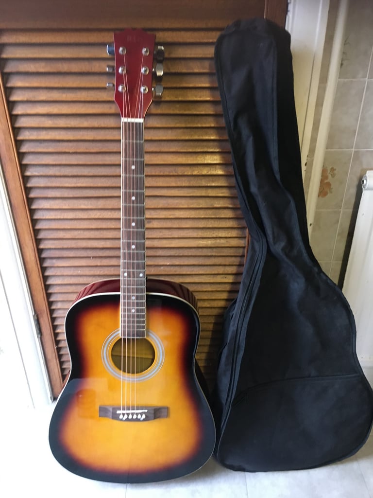 image for Guitar classical acoustic RI0 full size wide body dreadnought type with carryin bag 