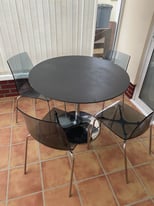 Dinning room table and 4 chairs 