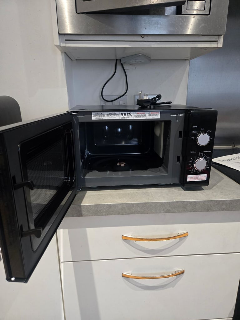 Brand new russell hobbs (rhm2060b) microwave with a small dent on the side (working perfectly)