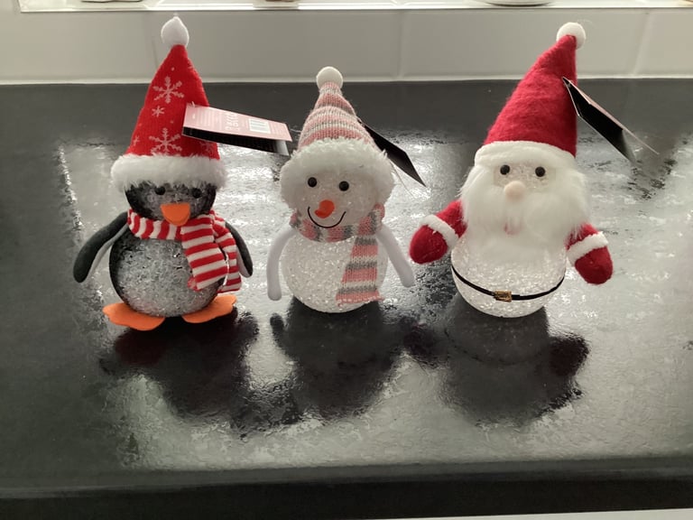 Three new light up Christmas ornaments 6.6 inches high £1 each