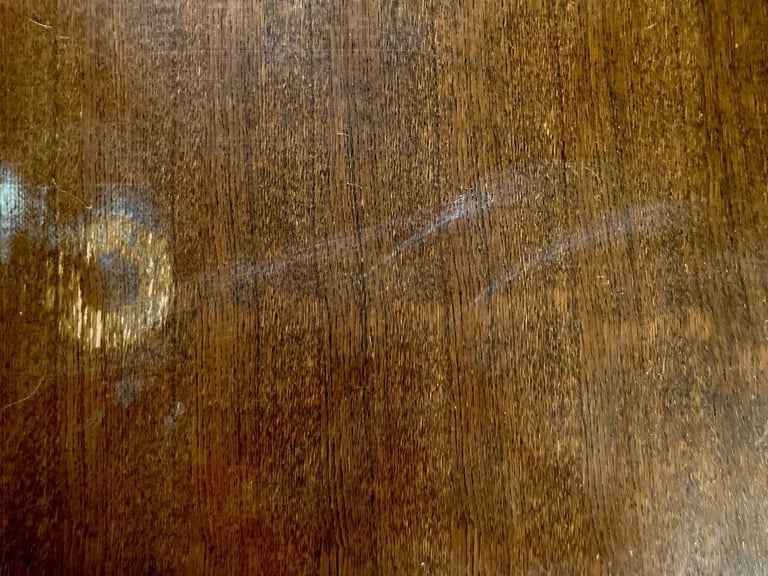 Dark mahogany finish dining table and six chairs