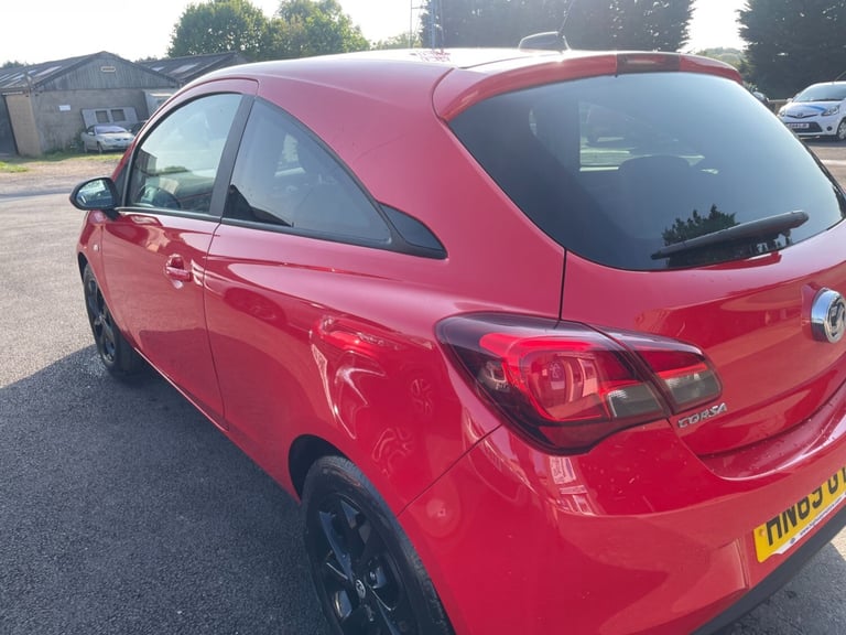 VAUXHALL CORSA 1.4 GRIFFIN with full main dealer service history, bright red,