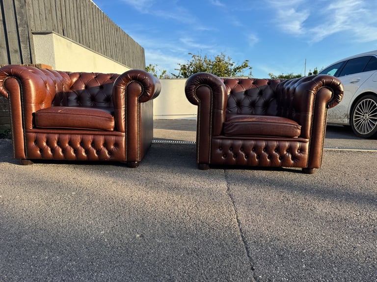 Pair of chesterfield faux brown leather club armchairs 