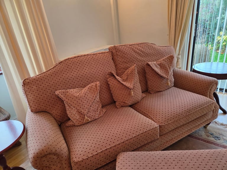 Two, two seater sofas and large foot stool 