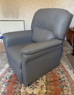 Dual motor rise and recline armchair.