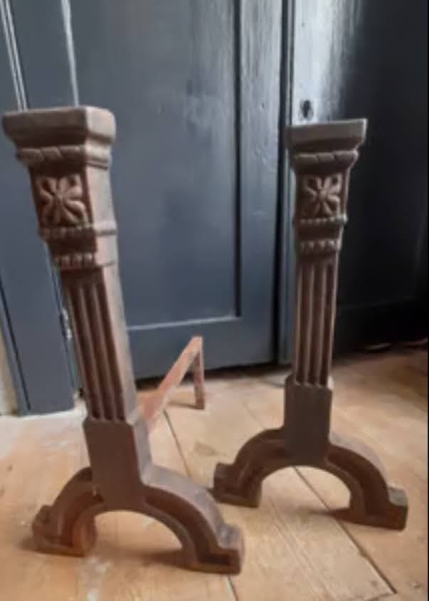 Cast iron andirons or fire dogs