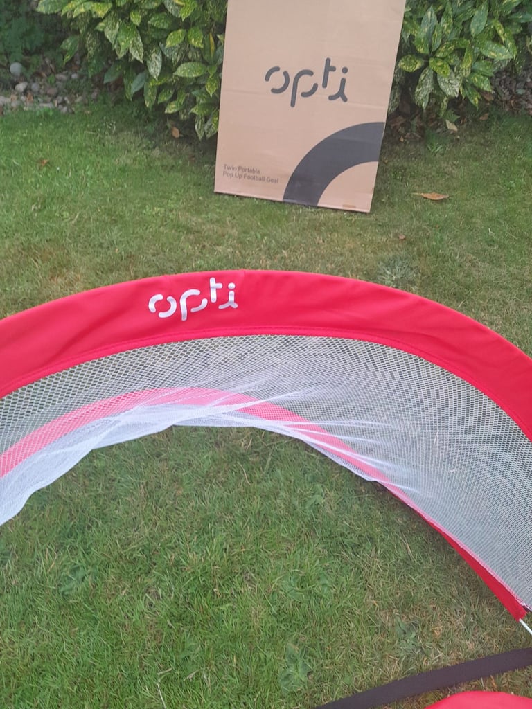 Twin portable pop up football by opti at Argos.  Plus storage bag and box