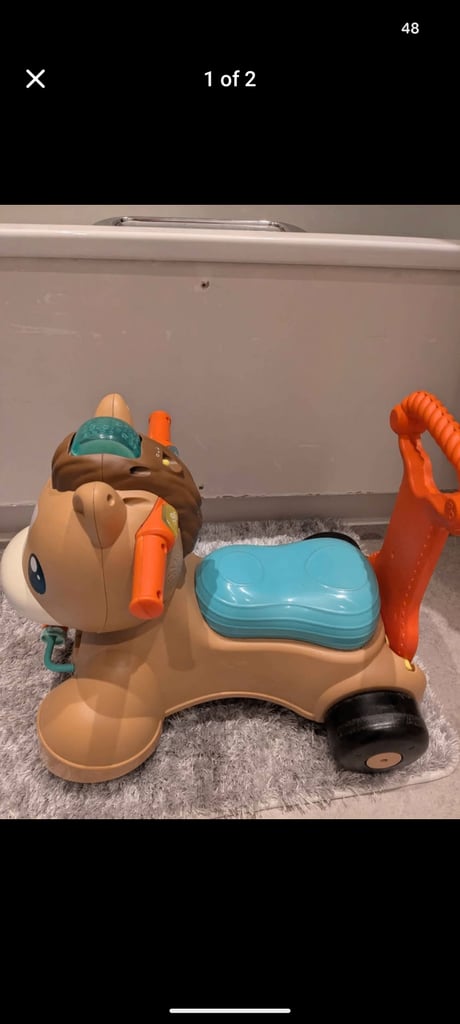 image for Fisher price ride on pony 