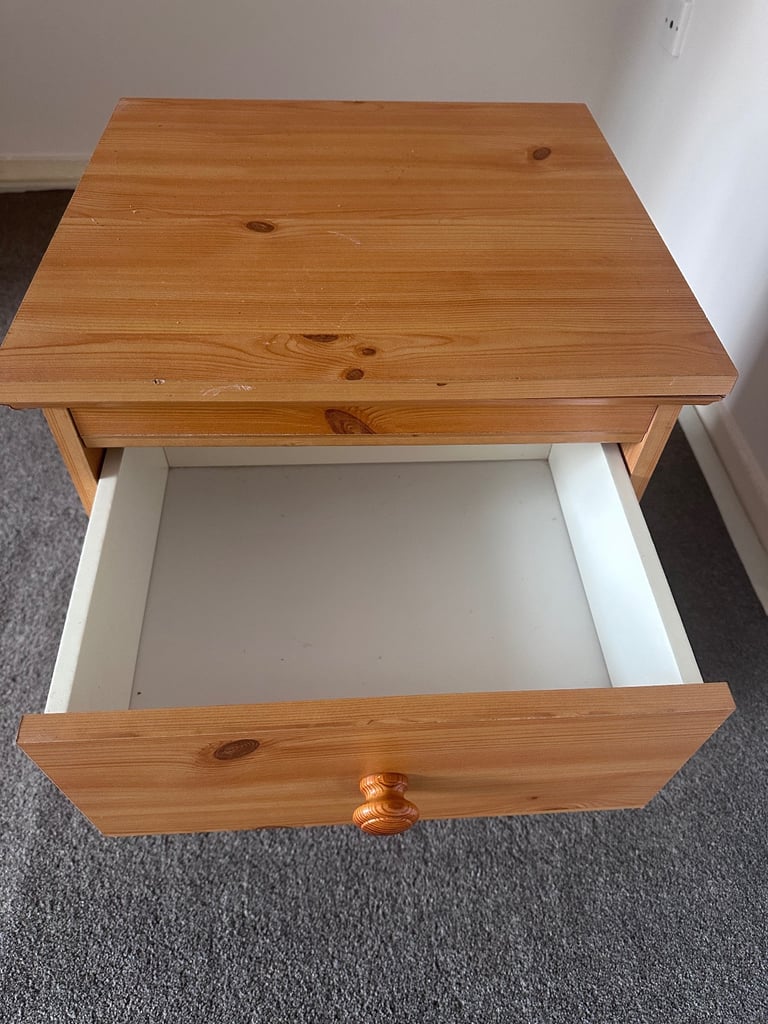 Bedside cabinet on casters 