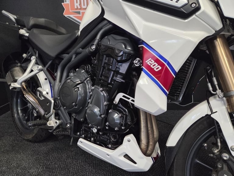 2013 Triumph Tiger Explorer 1215 in white with luggage.