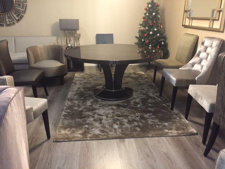 Luxury wooden dining table and velvet chairs 