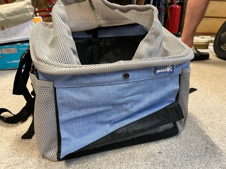 Dog carrier for bike or rucksack. 