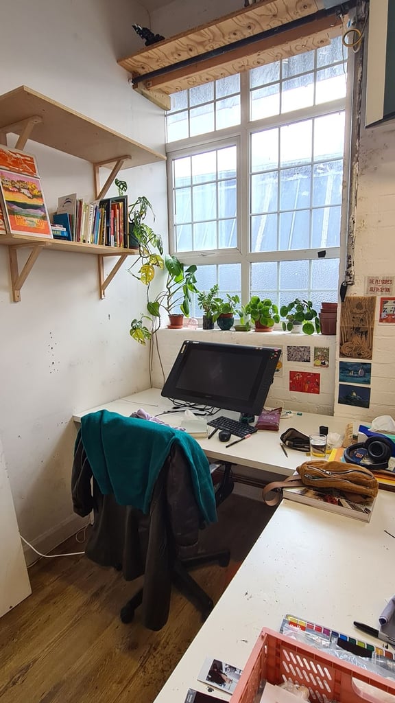 Deskspace in shared artist co-working space