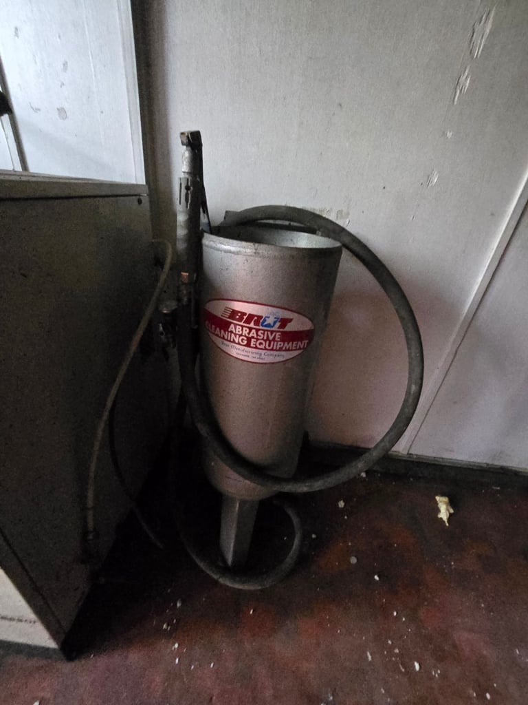 image for Sand blaster with equipment and air compressor and cabinet.