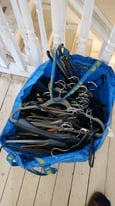 Tons of assorted clothes hangers 