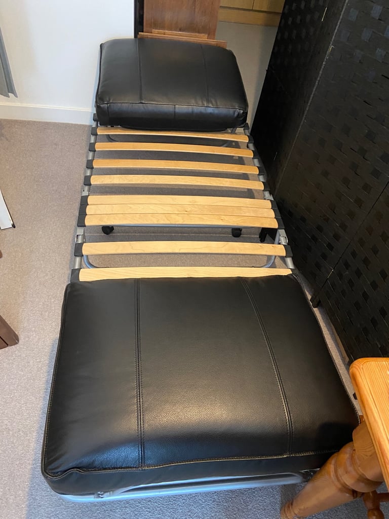2 firm decorative leather pillows.