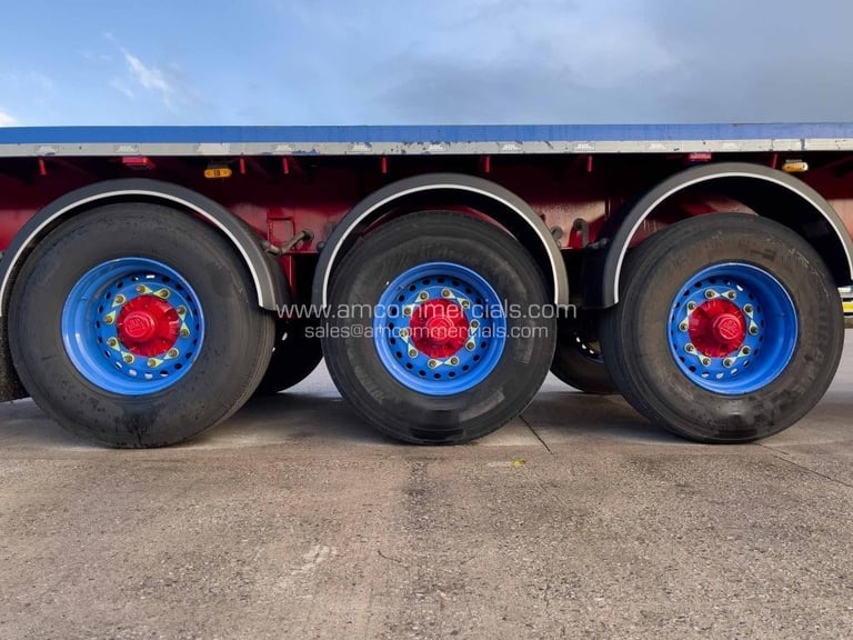 SDC TRI AXLE FLAT BED TRAILER 