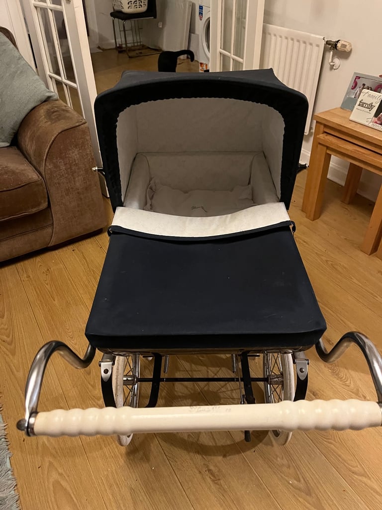 Children’s silver cross pram