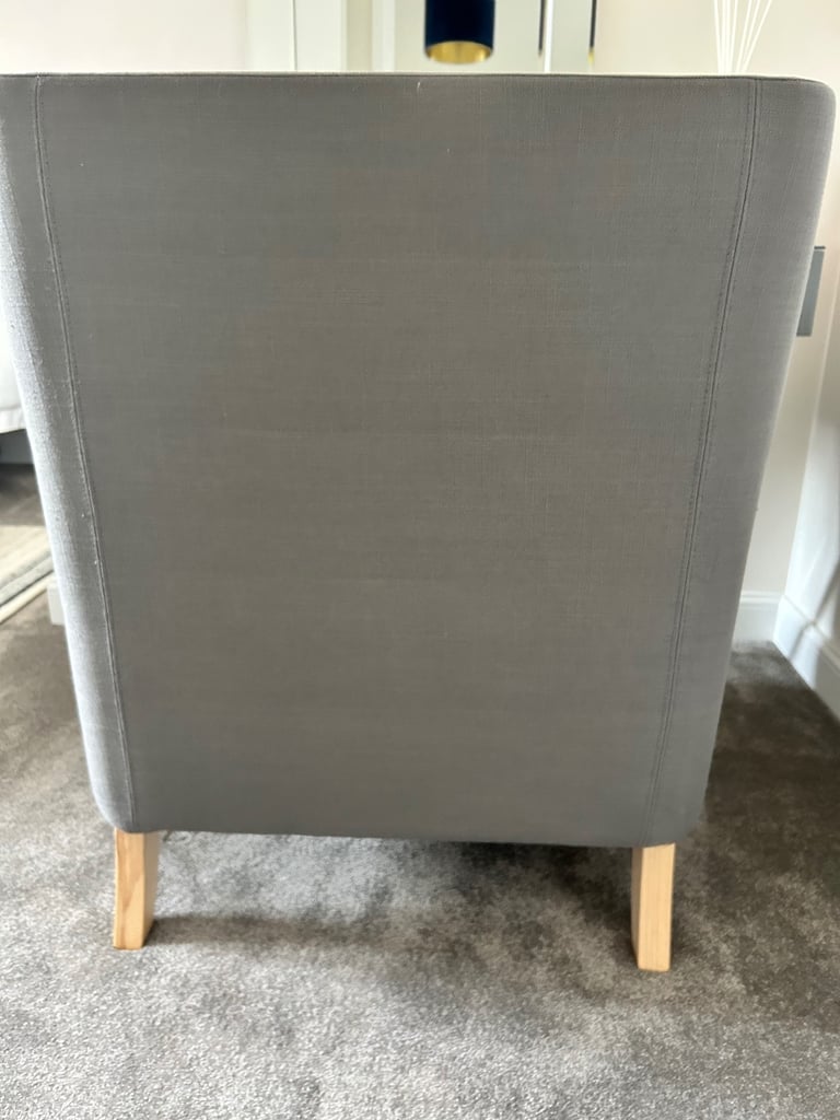 Grey studded armchair