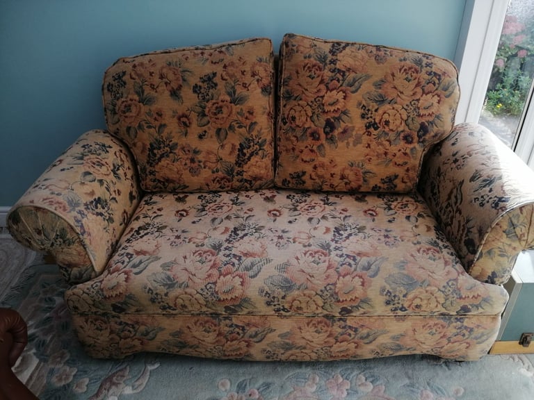 Small SofaSettee with drop down arm function