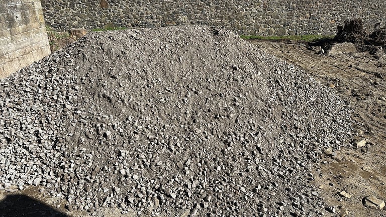 Topsoil £25 Type 1 £25 a ton . Turf mix £35 Aggregates. Logs skips 