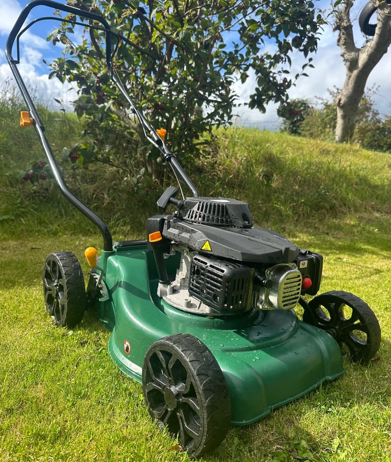 image for Petrol lawnmower like new mower has no bag but can be used without it 