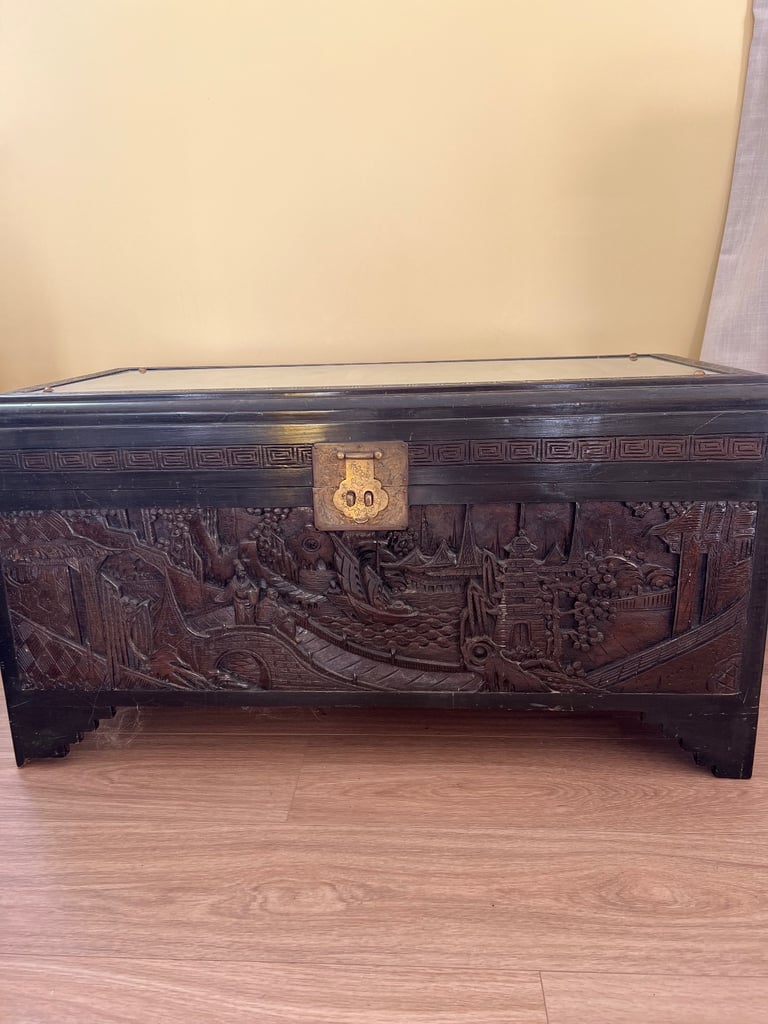 Carved Chinese camphor wood chest