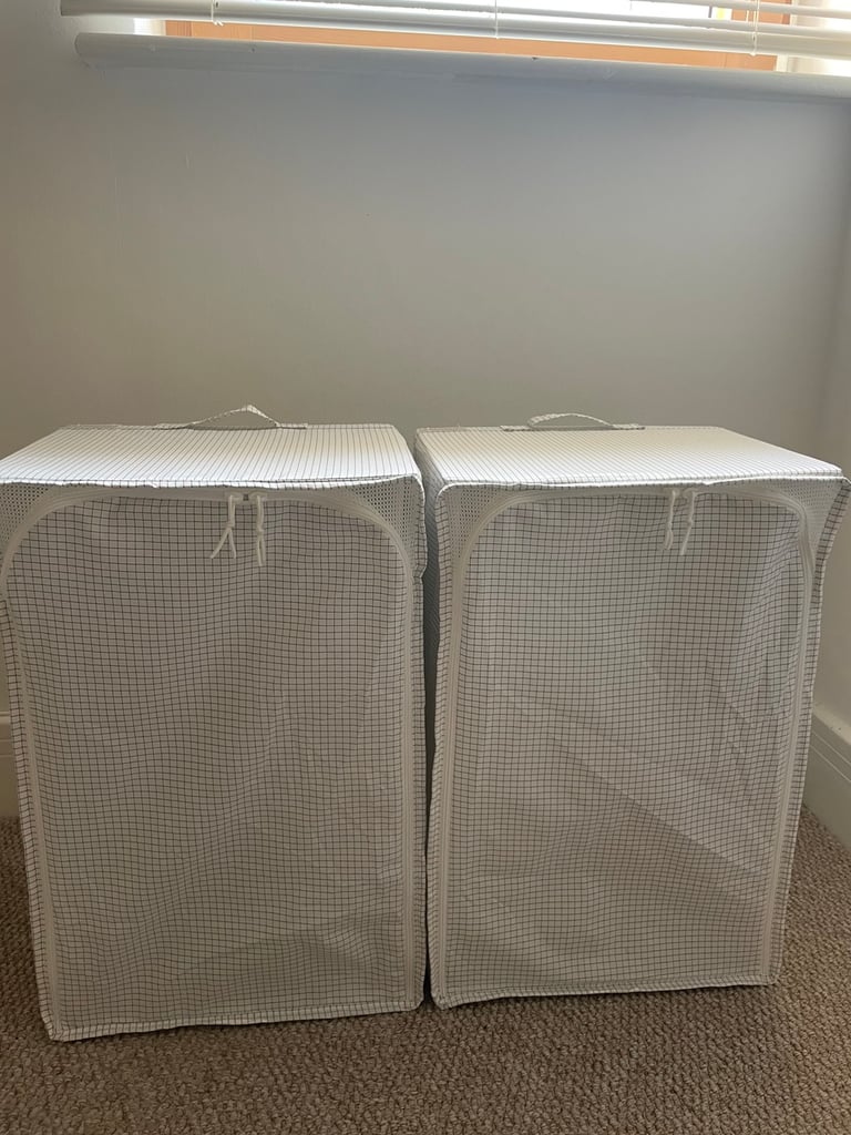 Two IKEA STUK storage boxes