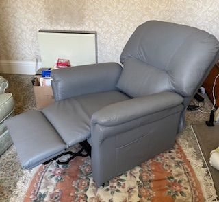Dual motor rise and recline armchair.