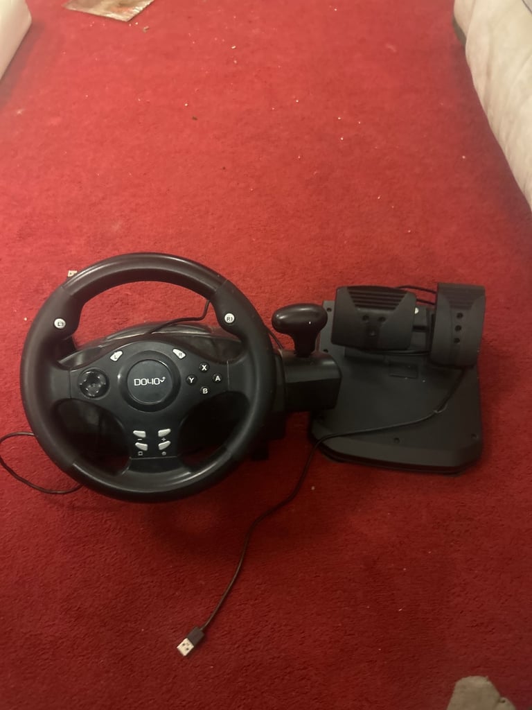 image for Racing steering wheel and peddles