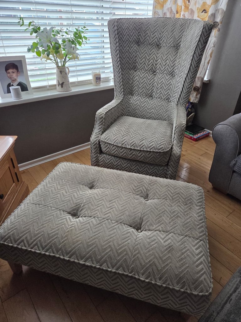 Armchair with maching footstool.  Come with 2 matching cushions 