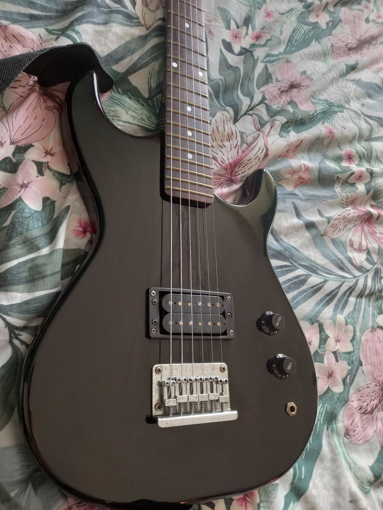 Vintage 1980s Encore single humbucker electric guitar. 