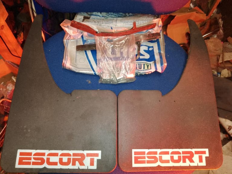 PAIR OF NEW OLD STOCK ESCORT MUD FLAPS