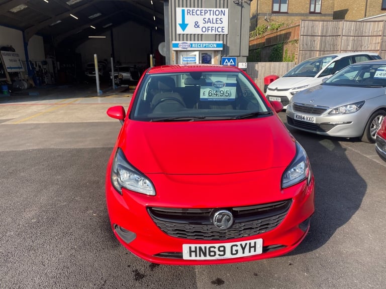 VAUXHALL CORSA 1.4 GRIFFIN with full main dealer service history, bright red,