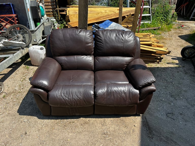Two seater brown leather recliner sofa free for collection