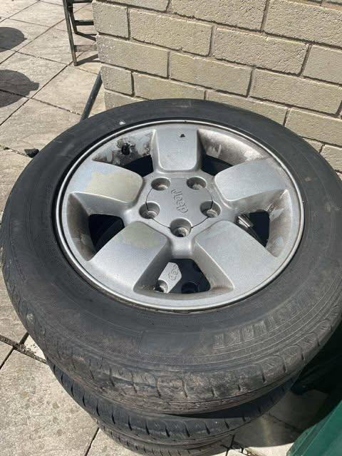 image for jeep grand cherokee WJ set of 4 alloy wheels & tires 225 65 17"