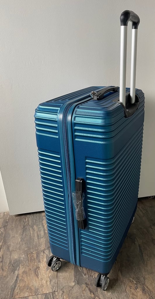 Large suitcase on wheels. Used just once on a return journey lightweight large 