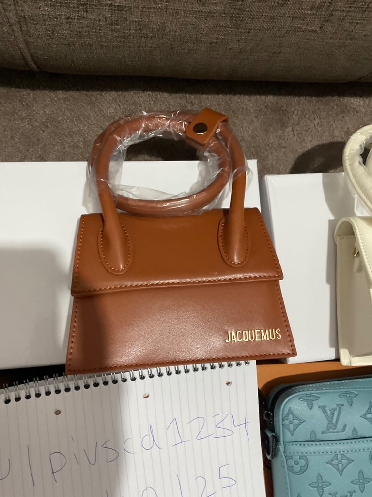 Assortment of designer women’s handbags