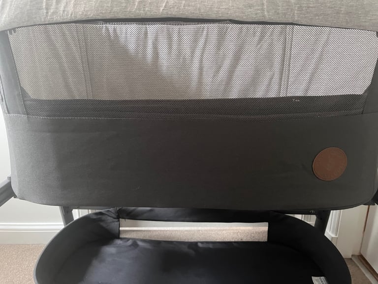 Maxi cosi iora next to me crib 