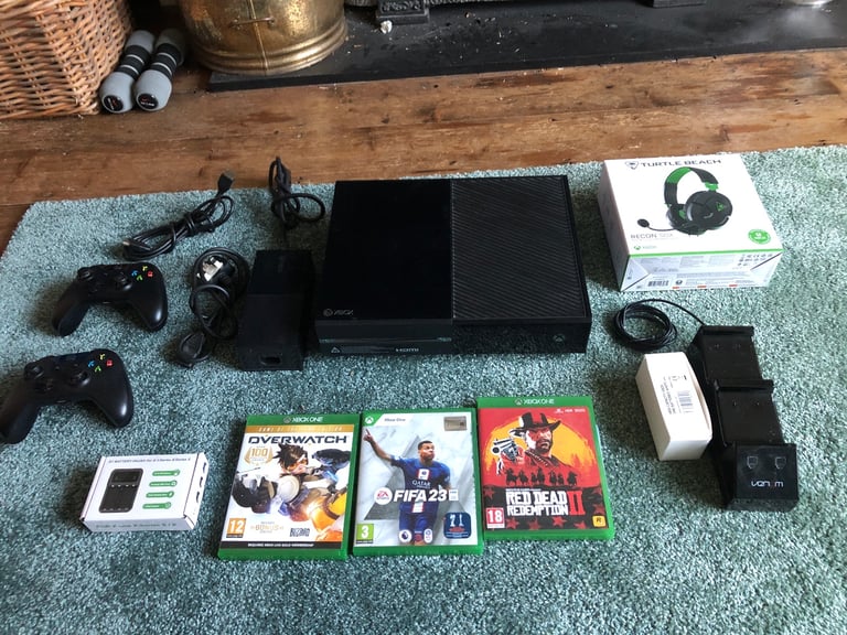Xbox one model 1540, 2 x controllers headphones, chargers, games.