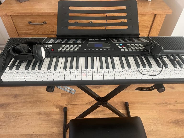 Electric keyboard stand stool headphones 