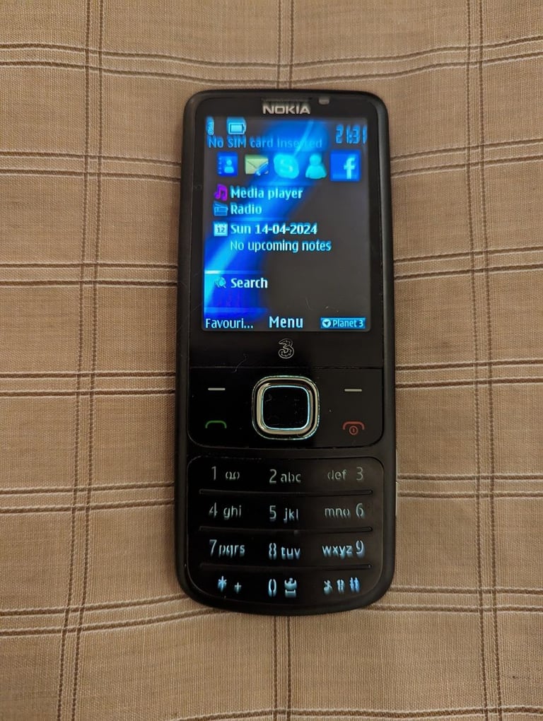 Nokia 6700 Classic with box, charger manual and accessories shown - retro vintage