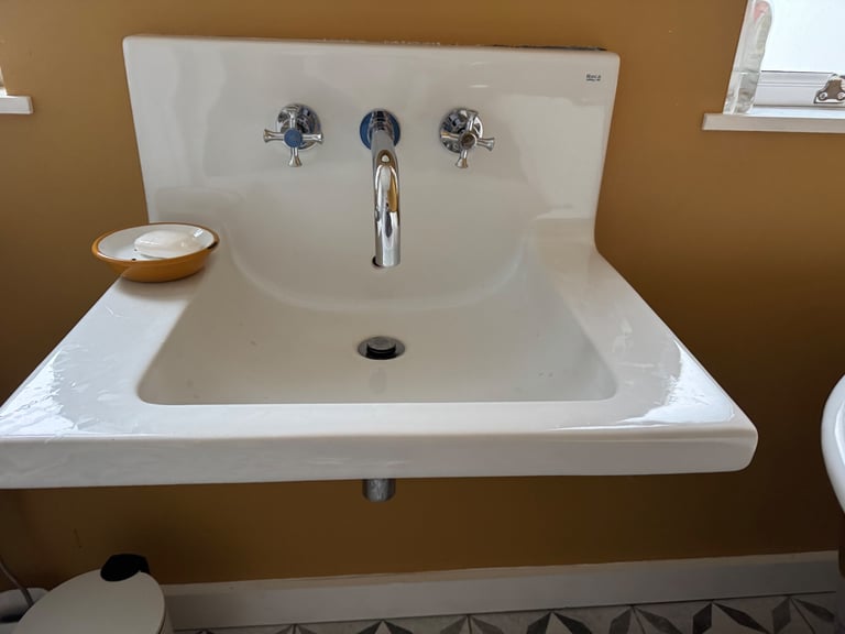 Roca wall mounted sink with back splash