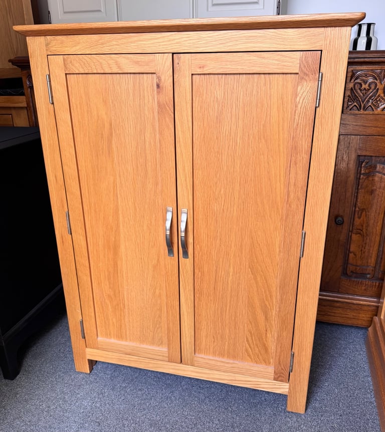 image for Solid oak storage cupboard in excellent condition 