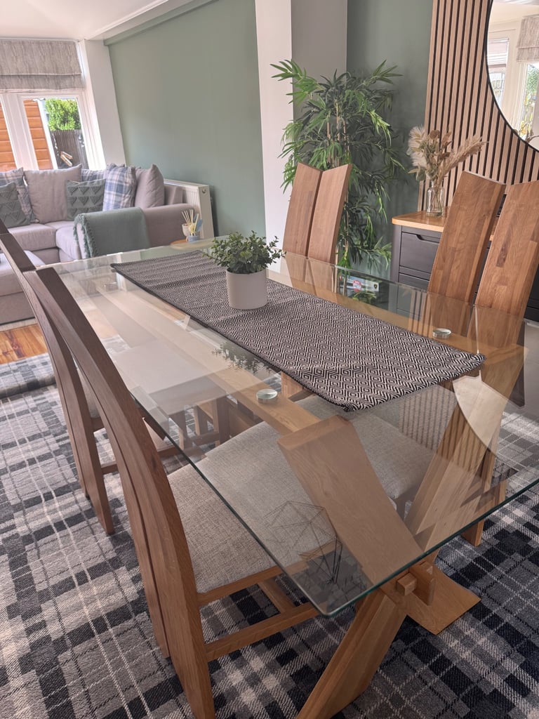 Glass dining table and four chairs