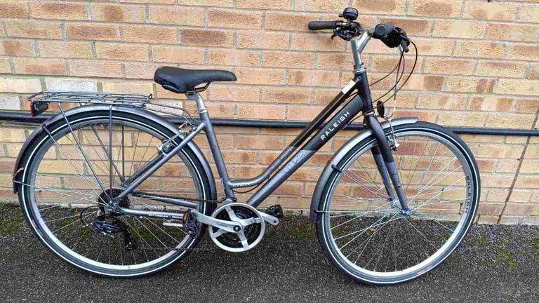 image for Lightweight Aluminium Raleigh Pioneer Hybrid bike in good condition with mudguards