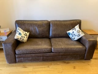 Four seater pure leather sofa/bed (dark brown)